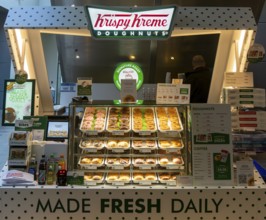 Krispy Kreme doughnuts stall in Buttermarket shopping centre, Ipswich, Suffolk, England, UK