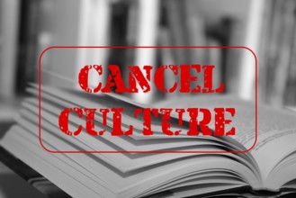 Symbolic image of the debate on the so-called cancel culture with an open book and a large red