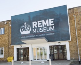 Sign at entrance to REME museum, MOD Lyneham, Wiltshire, England, UK