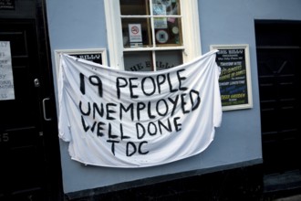 Protest banner on closed pub 'The Billy' against Tendring District Council Harwich, Essex, England,