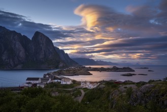 Cloudy landscape. The villages of Olenilsoy, Toppoya (Toppoy) and Hamnoy as well as the