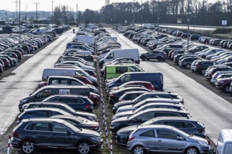 Large car park at the ferry terminal to the East Frisian islands of Norderney and Juist, Lower