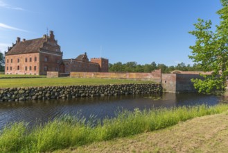 Broholm Castle, Gudme, 14th century, brick building, fortification, stone wall, water plants,