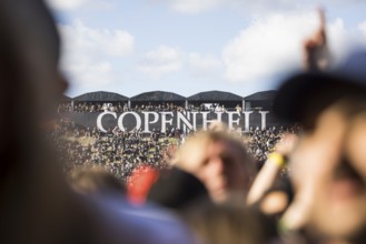 Festival visitors and logo at the Copenhell Metal Festival at Kløverparken Camping Copenhagen,