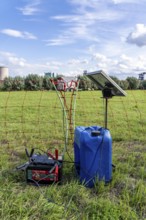 Electric pasture fence, designed to prevent molluscs, here sheep, from touching and climbing over