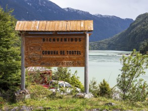 Welcome sign to village Caleta Tortel, at river Rio Baker, road Carretera Austral, Patagonia,