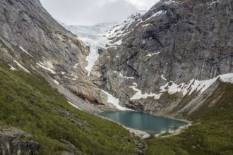 Aerial view of glacier Briksdalsbreen, a glacier tongue of Jostedalsbreen, glacier lake, Norway,