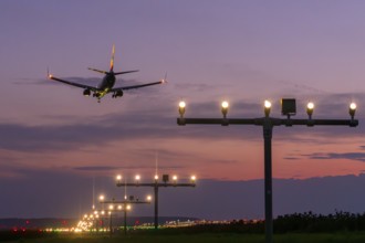 Passenger aircraft approaching, air traffic, after sunset, twilight, airport, Stuttgart,