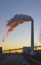 Mannheim coal-fired power station on a cold winter's day, plumes of smoke above the chimneys.