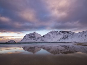 Snow-covered mountains at Vikstranden, Vestvagoy Island, Lofoten, Norway, Europe