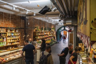 International, culinary specialities in the Freiburg market hall in the historic old town of