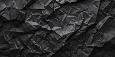 Black crumbled paper banner. KI generiert, generiert, AI generated