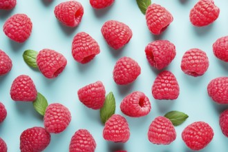 Top view of raspberry fruits on blue background. KI generiert, generiert AI generated