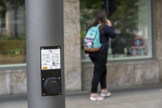 E-charging station in new smart poles, intelligent street lamps, test run, EON and the city of