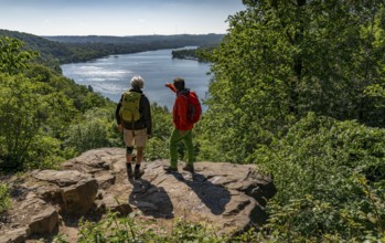 Hiking on the Baldeney Steig, a hiking trail around Lake Baldeney in Essen, a Ruhr reservoir, over