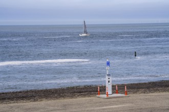 Westkapelse Zeedijk, North Sea dyke in Zeeland, can be used as a car park, parking ticket machine,