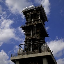 The extinguishing tower with lettering, landmark in Dortmund-Huckarde, Hansa coking plant,