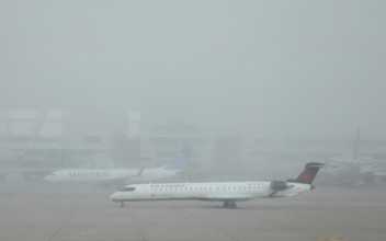 Denver, Colorado, Airliners on the ground in foggy weather at Denver International Airport (DEN)