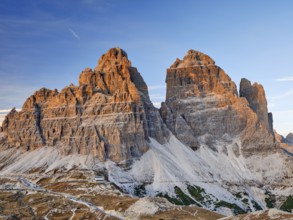 Three Peaks Pass road in autumn, sunrise, blue sky, Misurina, Italy, Europe