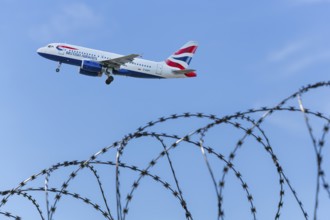 Symbolic image of security, British Airways, security fence, Stuttgart Airport, Baden-Württemberg,