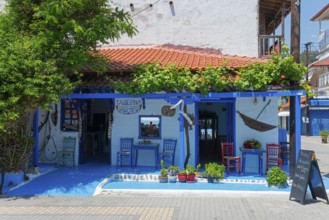 Inviting Greek taverna with blue and white colours and a cosy atmosphere, Sarti, Sithonia,