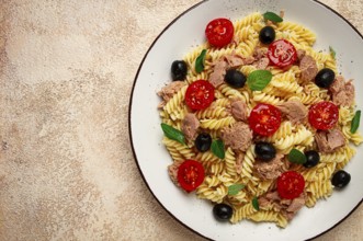 Tuna salad, fusilli pasta, olives and cherry, olive oil, homemade