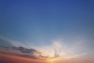 Dramatic sunset skies, cloudscape of rich color twilight sky. Sunset cloud background.