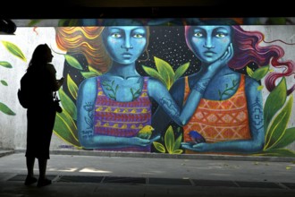 Blue woman, graffiti by Peruvian street artist Bronik, street art in the Baratashvili underground