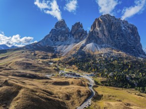 The peaks of the Sassolungo Group, Passo Sella, drone shot, Val Gardena, Dolomites, Autonomous