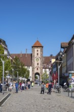 Pedestrian zone, shopping street with the Obertor, historic town gate of Villingen,