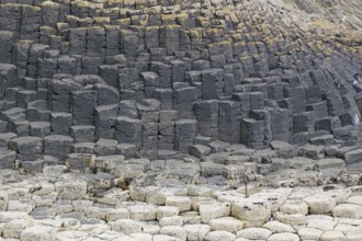 Close-up view of hexagonal basalt columns and rocks on the coast, Hebridean Overture, Isle of