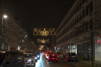 Car traffic in the old town centre during the Christmas market, Nuremberg, Middle Franconia,