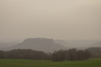 Large amounts of Sahara dust obscure the sun and cloud the distant view to Lilienstein and