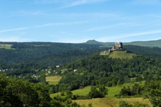 View of the medieval castle of Murol in the Auvergne Volcanoes Regional Natural Park, Puy de Dome,