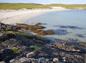 Rocky headland and sandy beach at Bagh a Deas, South Bay, Vatersay island, Barra, Outer Hebrides,