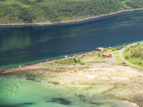 View from mountain range above village Raften down to shore at the Raftsund, the strait between