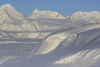 Mountainous winter landscape in the Arctic, sunny, Kulusuk, East Greenland, Greenland, North