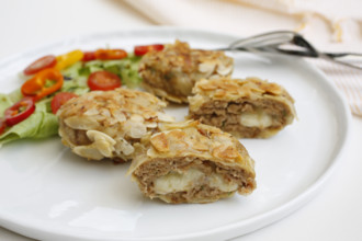 Swabian cuisine, meatballs wrapped in almonds, mixed minced meat, meatballs filled with cheese,