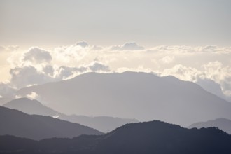 View of hills with cloud forest, Dramatic clouds between the mountains, Province of San José, Costa