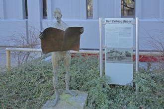 Sculpture Newspaper Reader by Karl Ulrich Nuss 2005 with historical text, inscription, bronze