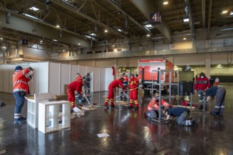 Construction of a vaccination centre for corona vaccinations, in a hall at Messe Essen, by the