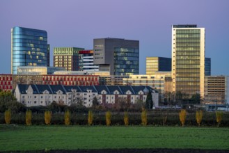 Skyline of the houses in the media harbour, in front of it residential buildings in the Hamm