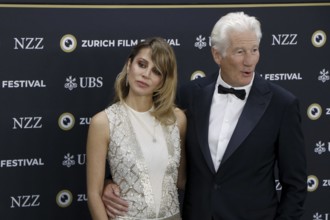 Richard Gere with woman Alejandra Gere at the premiere of Wisdom of Happiness, A heart-to-heart