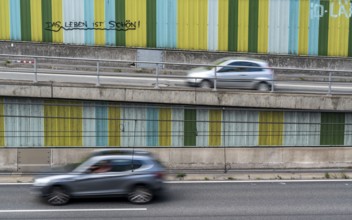 Motorway A40, Ruhrschnellweg, in the through road in Essen, noise barrier, with the slogan, life is