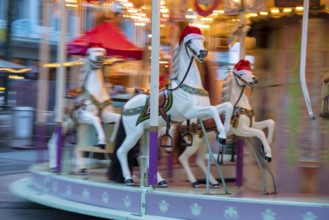 Pre-Christmas season, Christmas market on Kennedyplatz in the city centre of Essen, carousel,