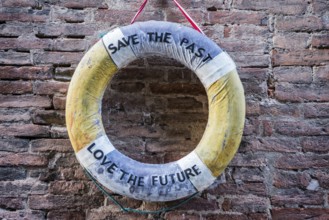 Lifebuoy with references to climate change, message, slogan, climate protection, future