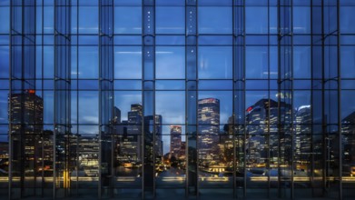 Glass surface facade mirroring an iconic skyline in evening light, AI generated