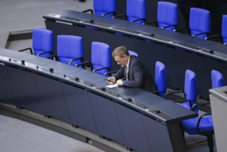 Christian Lindner (FDP), Federal Minister of Finance, sits on the government bench in the Bundestag