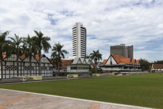 Modern buildings and green field in the city centre of Kuala Lumpur, Malaysia, Asia