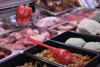 Variety of fine meat products in the butchery (Variety of fine meat products in the butchery)